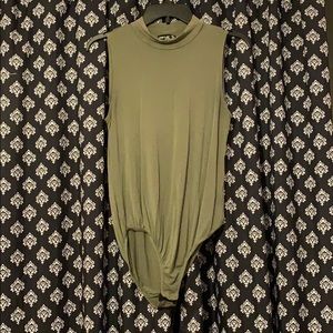 Green turtleneck bodysuit